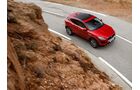 Jaguar E-Pace 2018 schräg oben fahrend Kurve rot